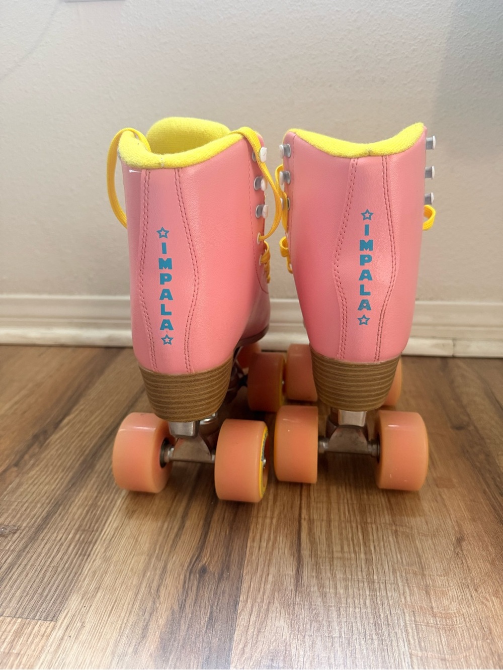 Impala Girls Pink Roller Skates with Yellow Accents